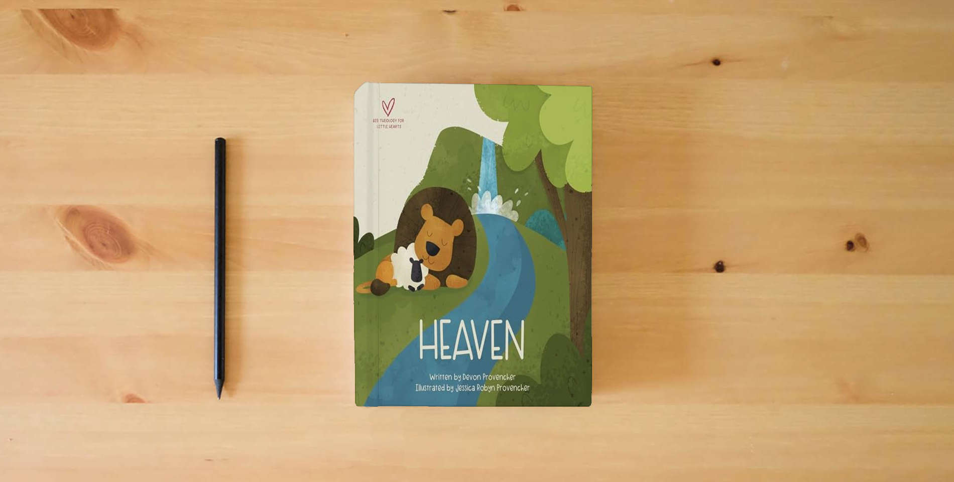 The book Heaven (Big Theology for Little Hearts) is on the table