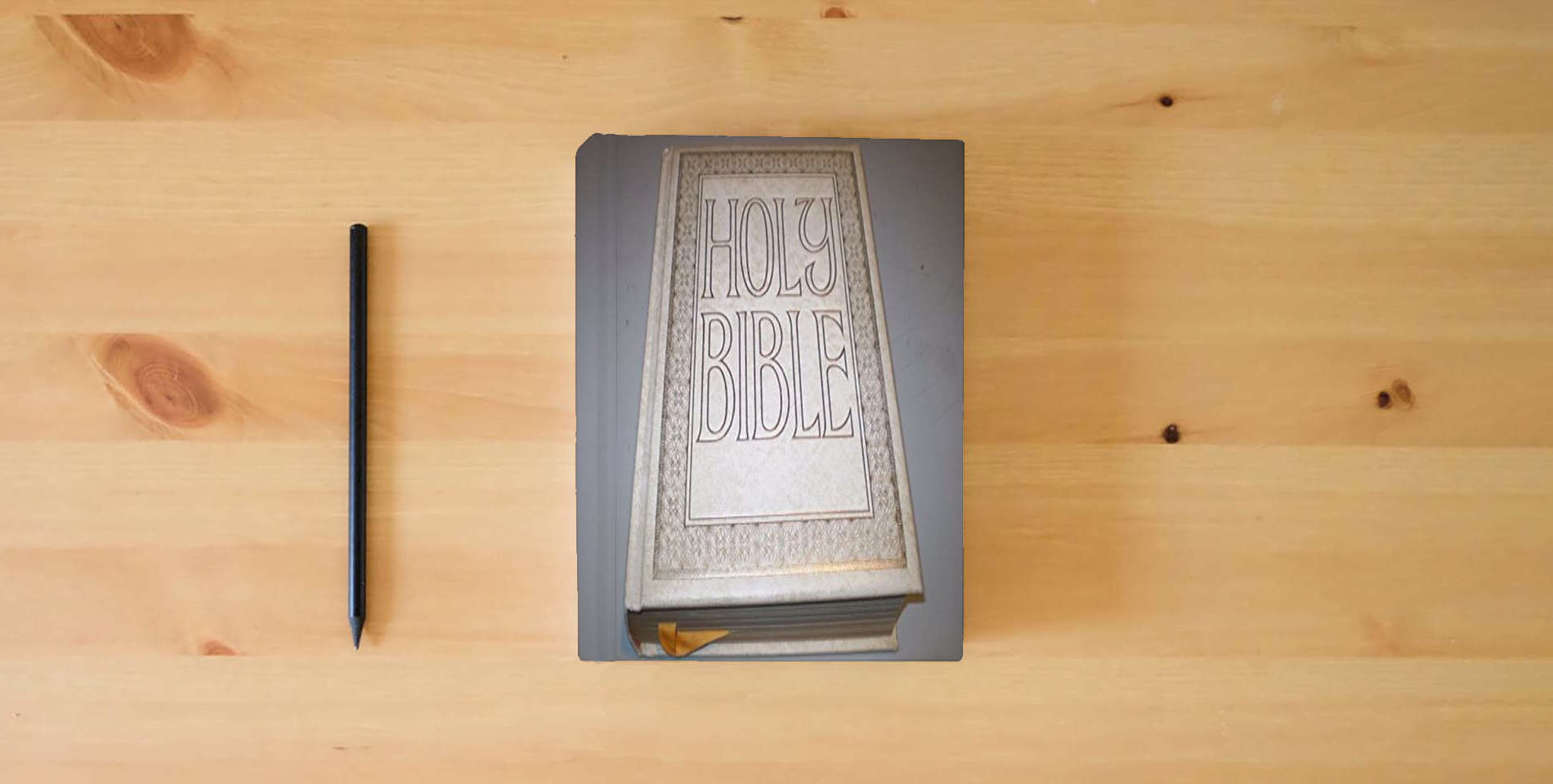 The book Holy Bible - Containing Both the Old and the New Testaments - Red Letter Edition (King James Version) New Clarified Reference Bible is on the table