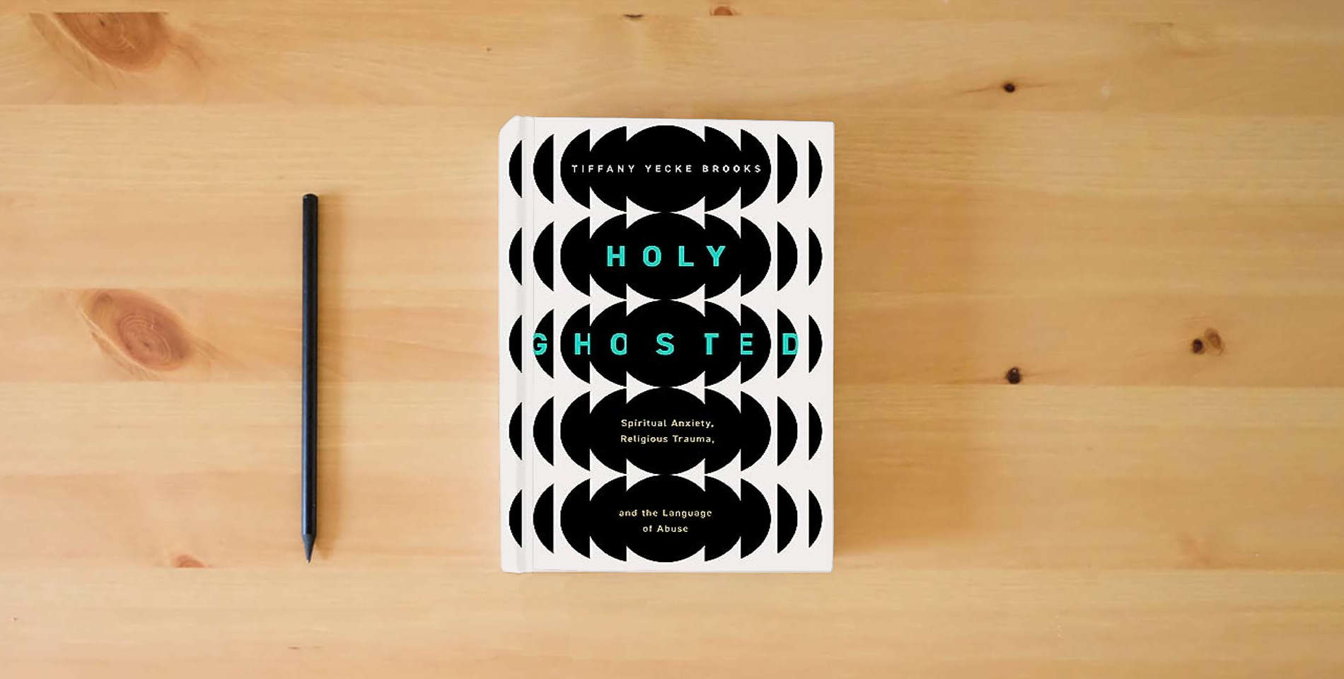 The book Holy Ghosted: Spiritual Anxiety, Religious Trauma, and the Language of Abuse is on the table
