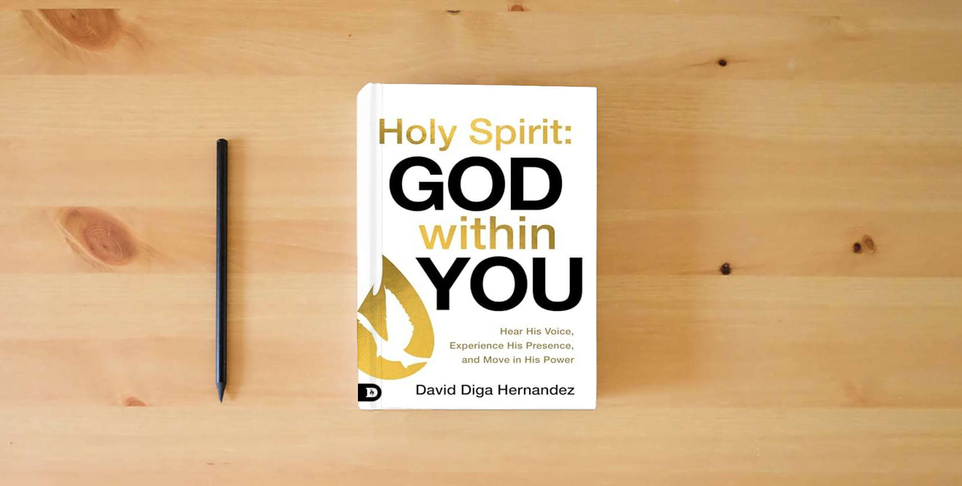 The book Holy Spirit: God Within You: Hear His Voice,Experience His Presence,and Move in His Power is on the table