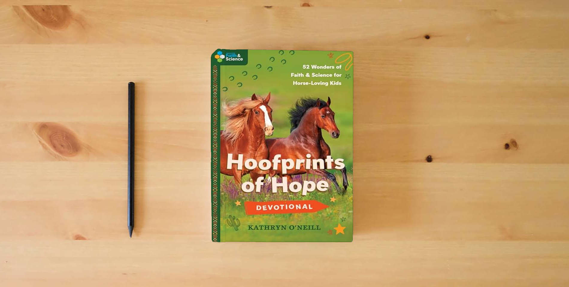 The book Hoofprints of Hope Devotional: 52 Wonders of Faith and Science for Horse-Loving Kids is on the table