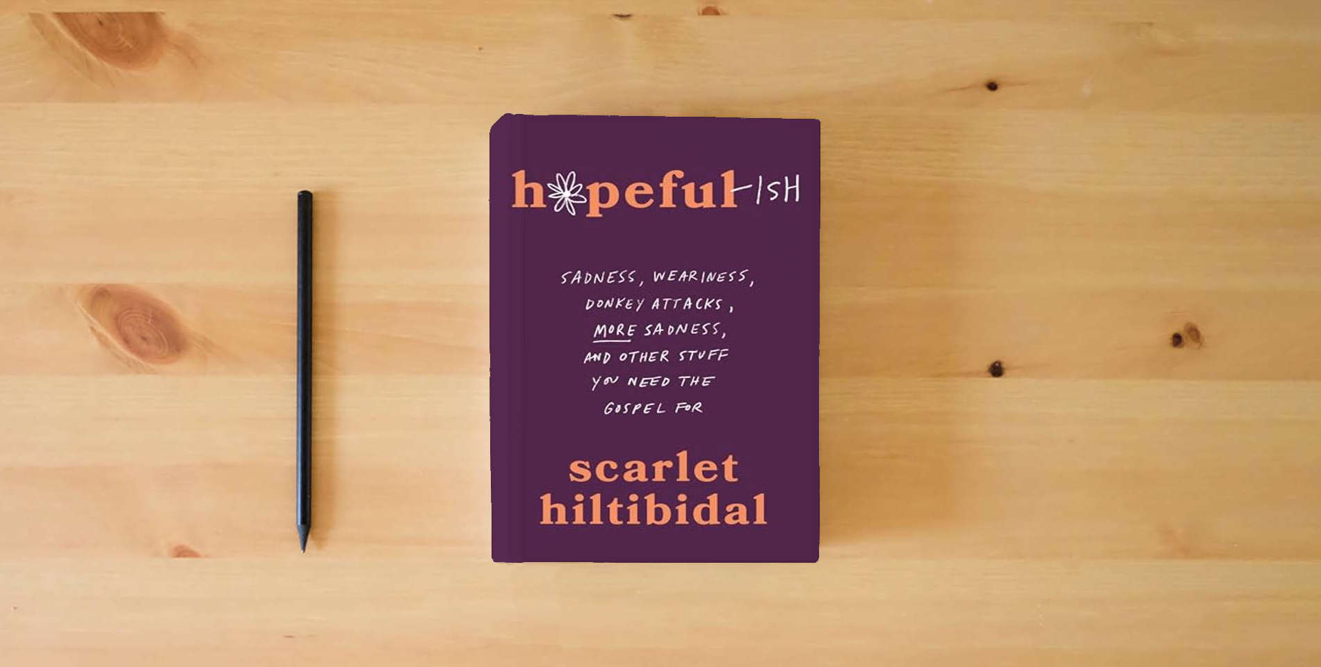 The book Hopeful-ish: Sadness, Weariness, Donkey Attacks, More Sadness, and Other Stuff You Need the Gospel For is on the table