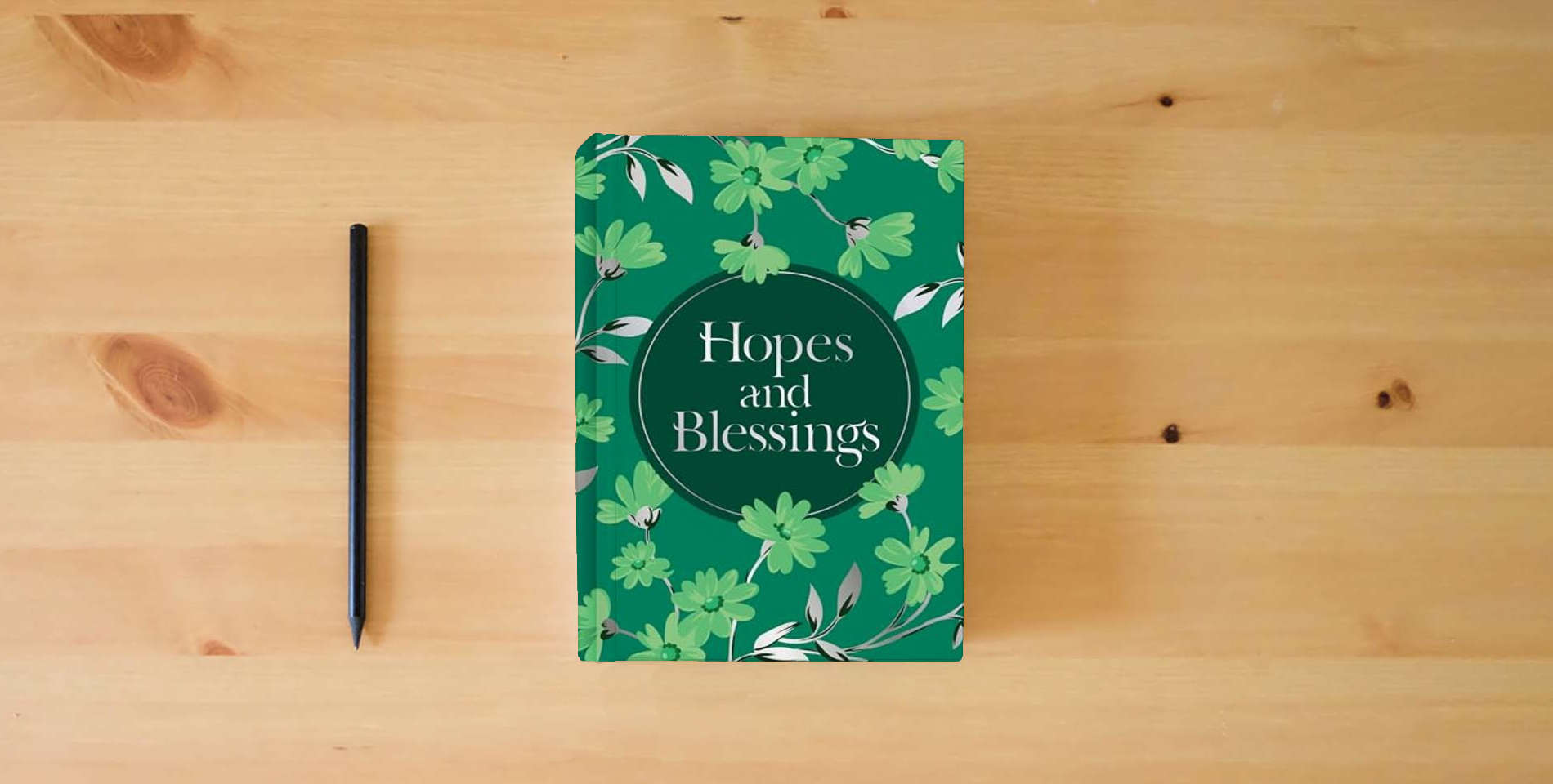 The book Hopes and Blessings (Prayer Book) is on the table
