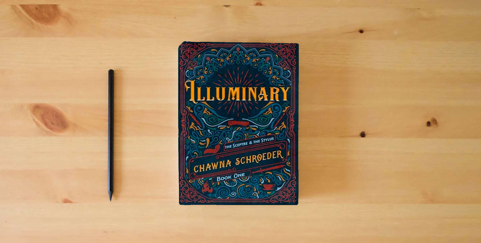 The book Illuminary (The Sceptre & the Stylus) is on the table