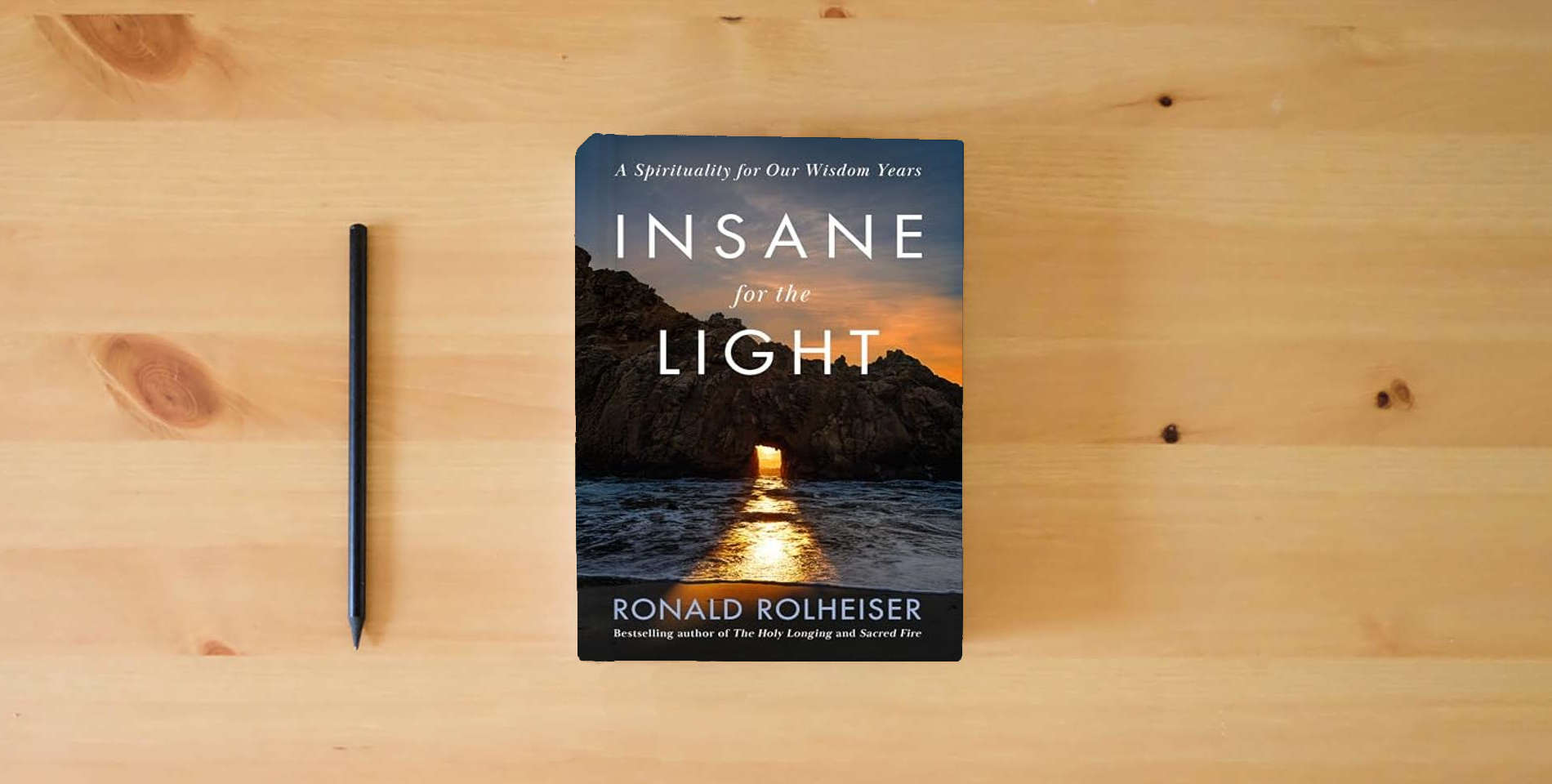 The book Insane for the Light: A Spirituality for Our Wisdom Years is on the table