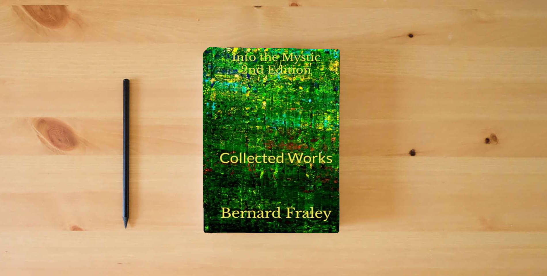 The book Into the Mystic 2nd Edition: Collected Works is on the table