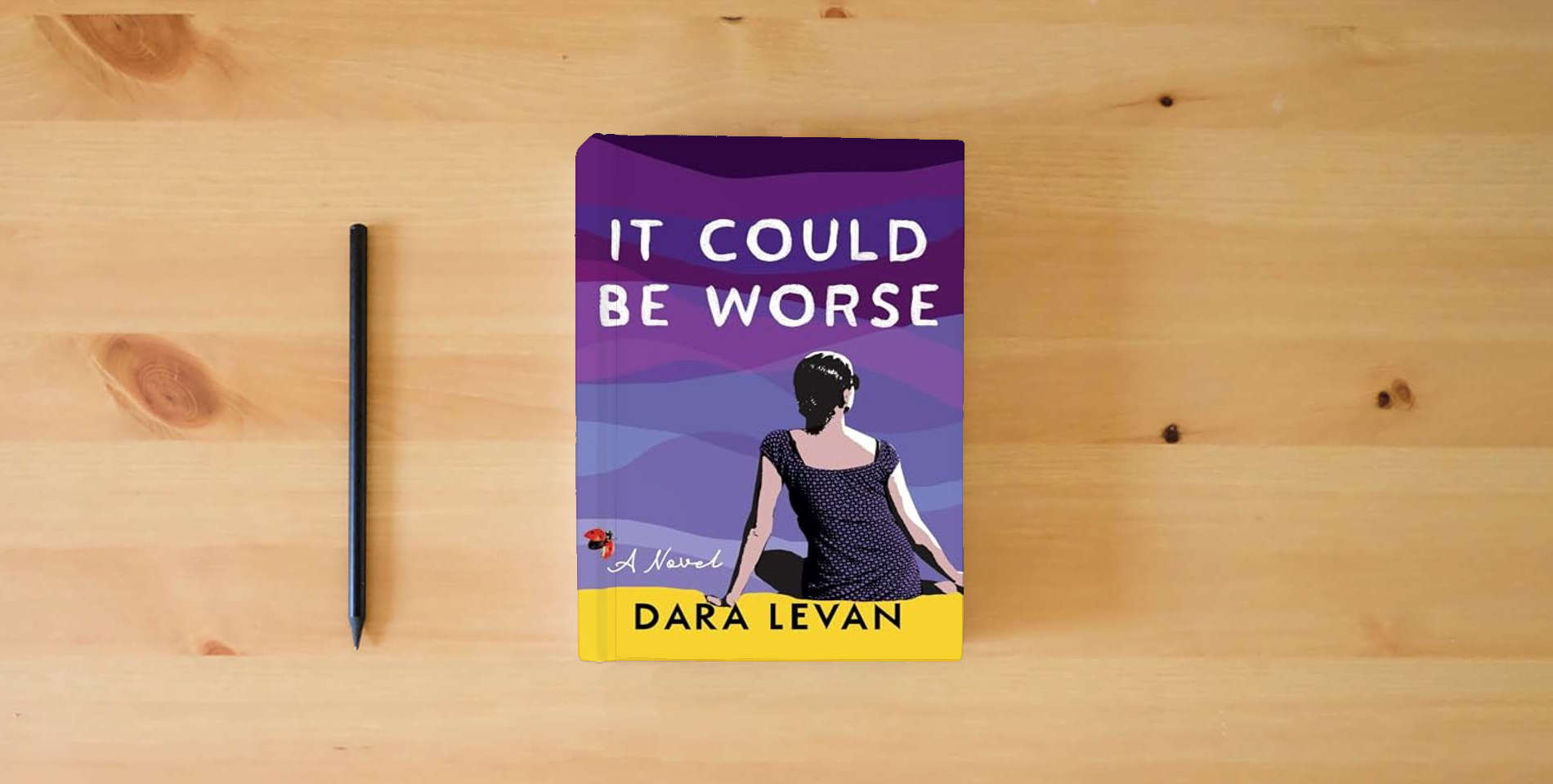 The book It Could Be Worse is on the table