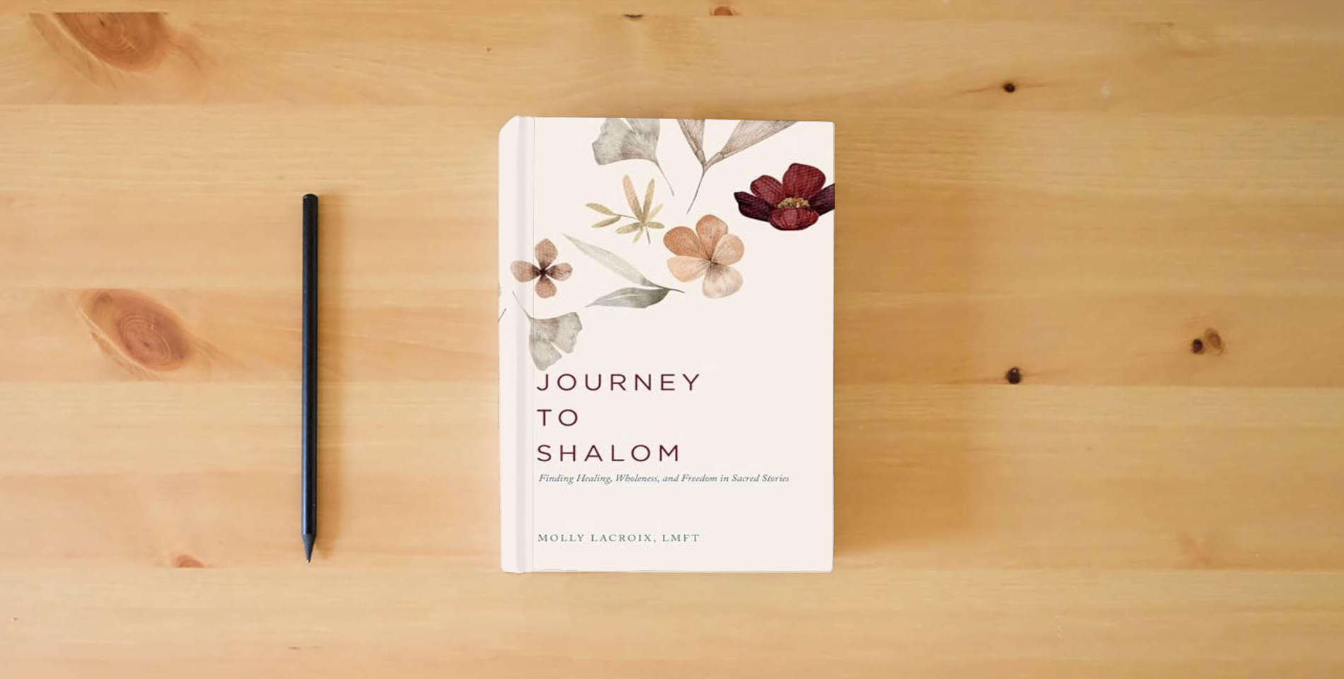 The book Journey to Shalom: Finding Healing, Wholeness, and Freedom In Sacred Stories is on the table
