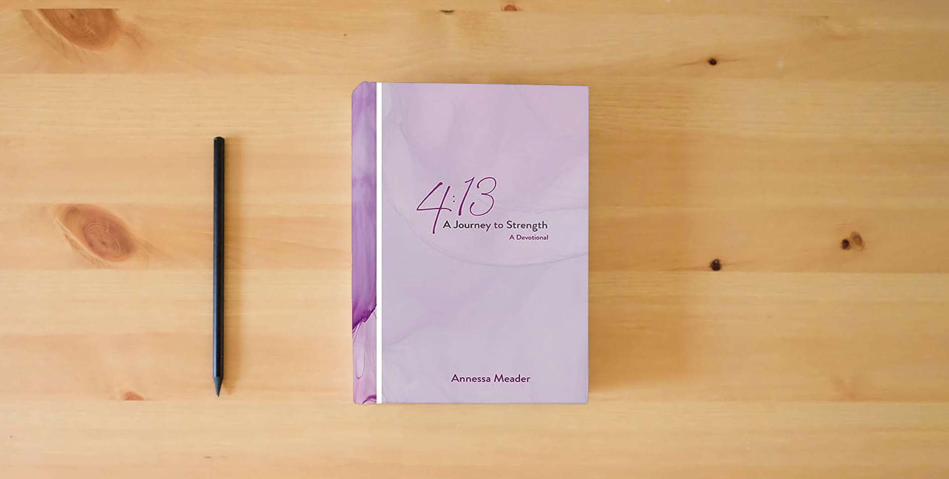The book 4: 13: A Journey to Strength, A Devotional is on the table