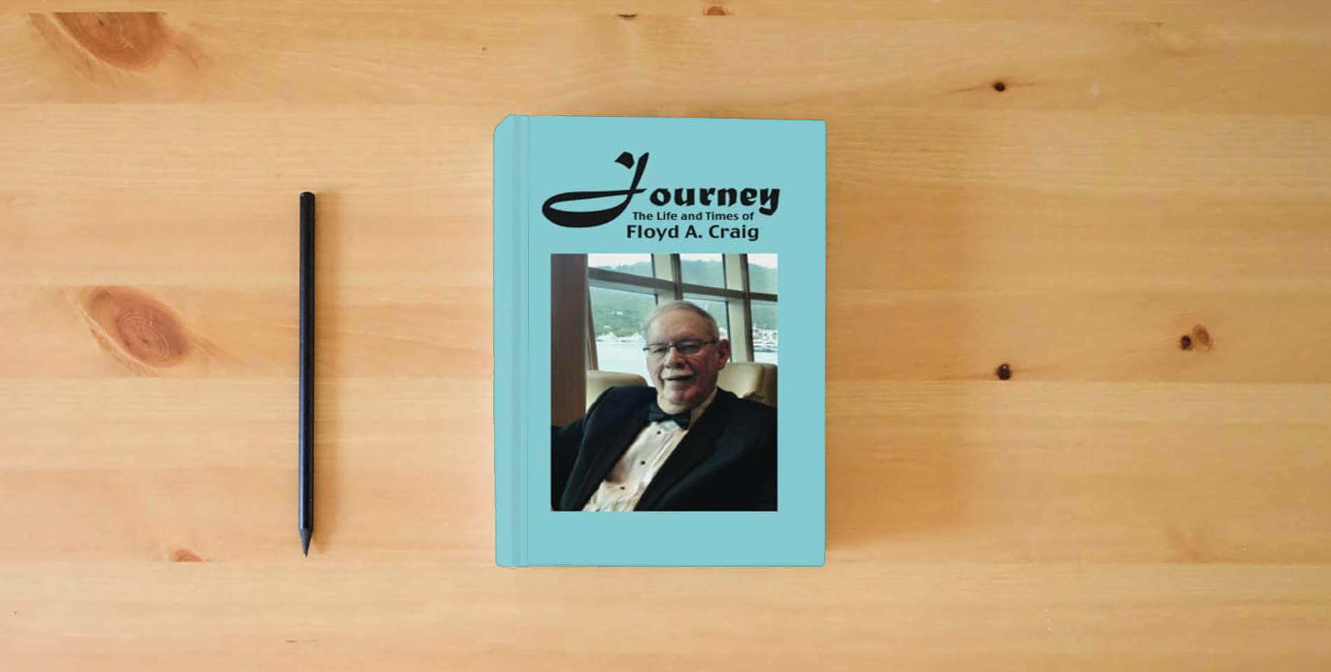 The book Journey: The Life and Times of Floyd A. Craig is on the table
