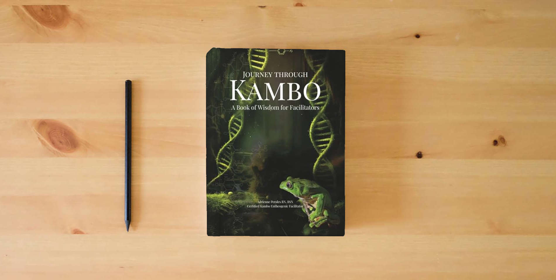 The book Journey through Kambo: A Book of Wisdom for Facilitators is on the table