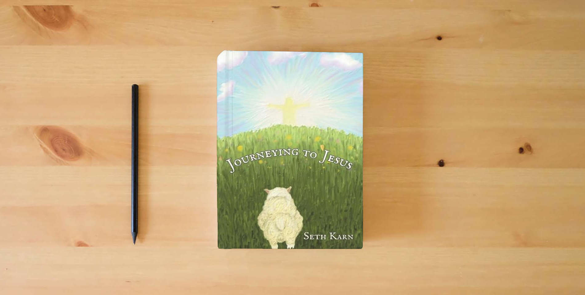 The book Journeying to Jesus is on the table