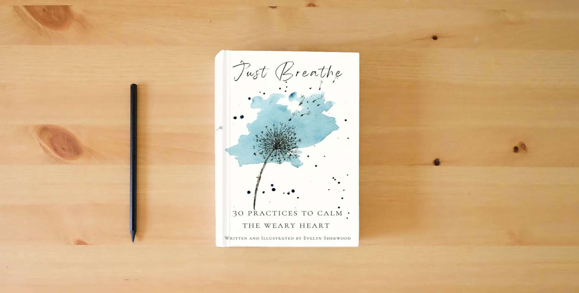 The book Just Breathe: 30 Practices To Calm The Weary Heart is on the table