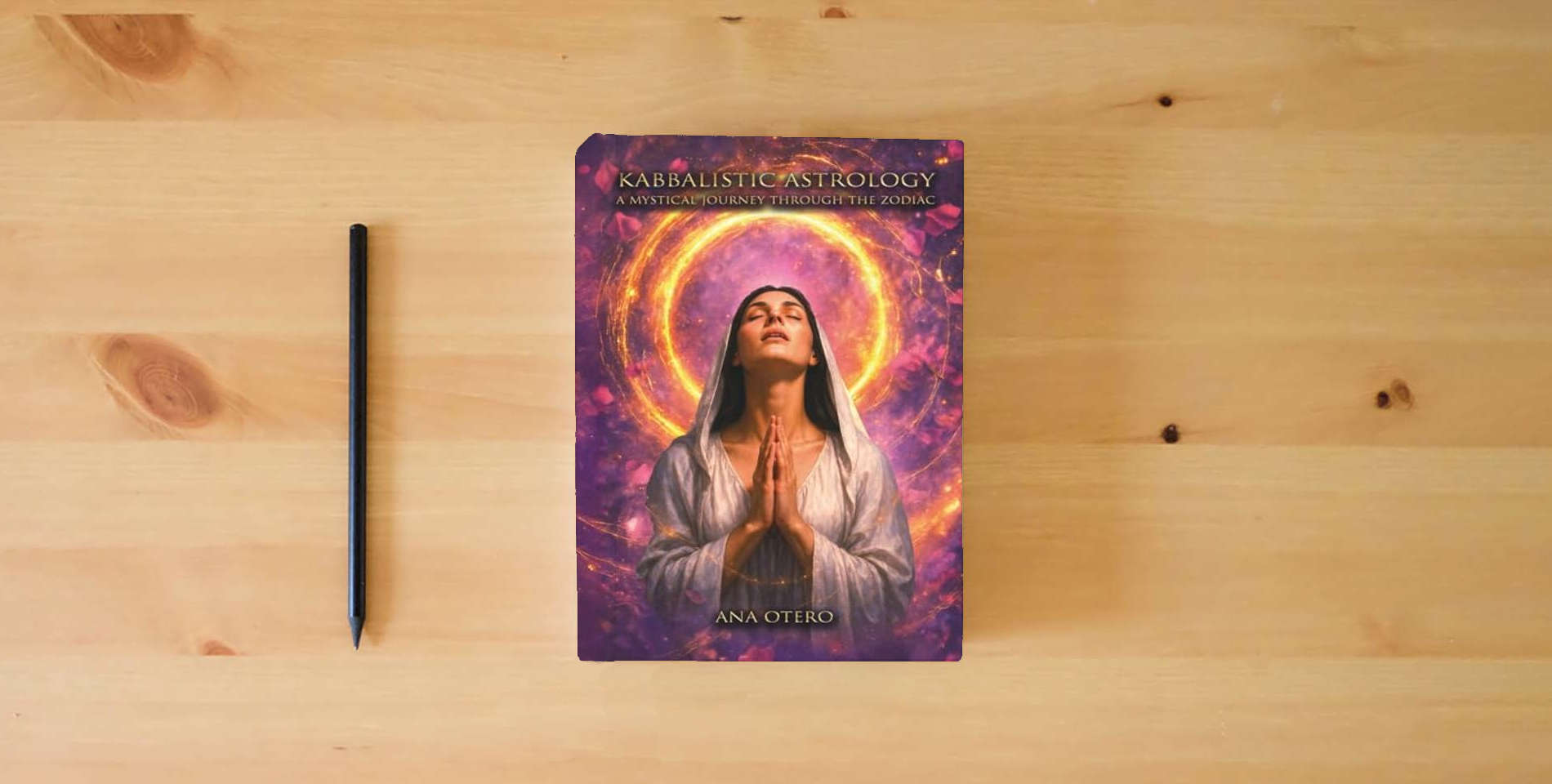 The book Kabbalistic Astrology: A Mystical Journey Through the Zodiac is on the table