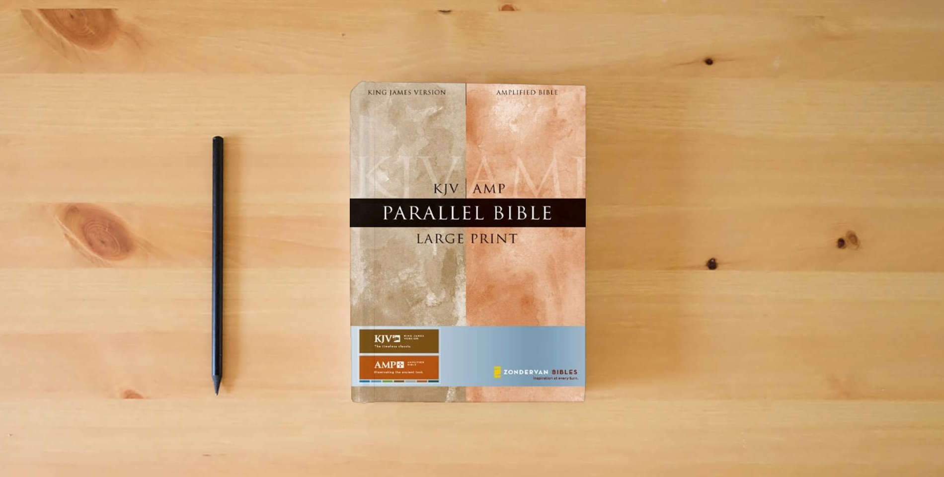 The book KJV/Amplified Parallel Bible, Large Print (King James Version) is on the table