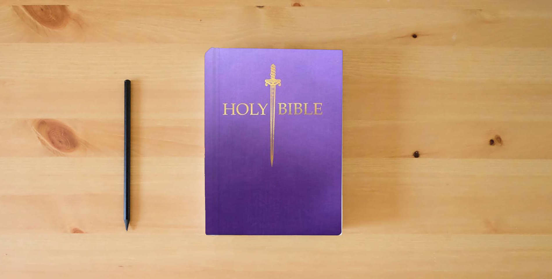 The book KJV Sword Bible, Large Print, Royal Purple Ultrasoft: (Red Letter, 1611 Version) (King James Version Sword Bible) is on the table