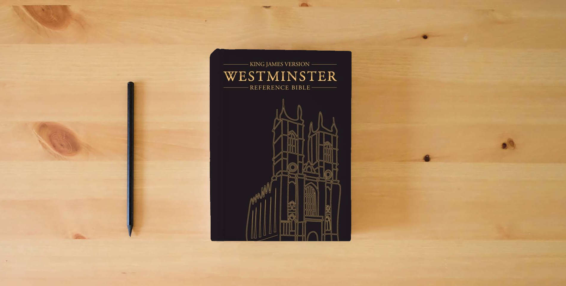The book KJV Westminster Reference Bible, Black Goatskin Leather, KJ556:XE is on the table