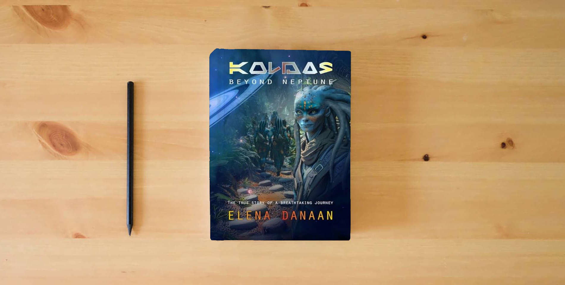 The book KOLDAS - Beyond Neptune: The true story of a breathtaking journey to the origins of Time and Creation is on the table