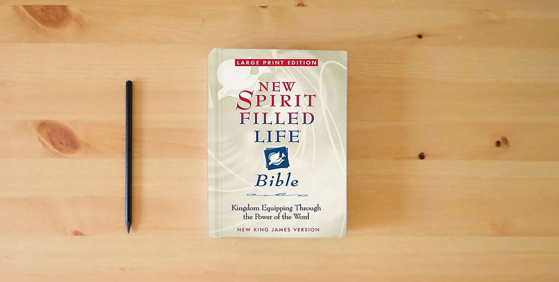 The book Large Print New Spirit Filled Life Bible is on the table