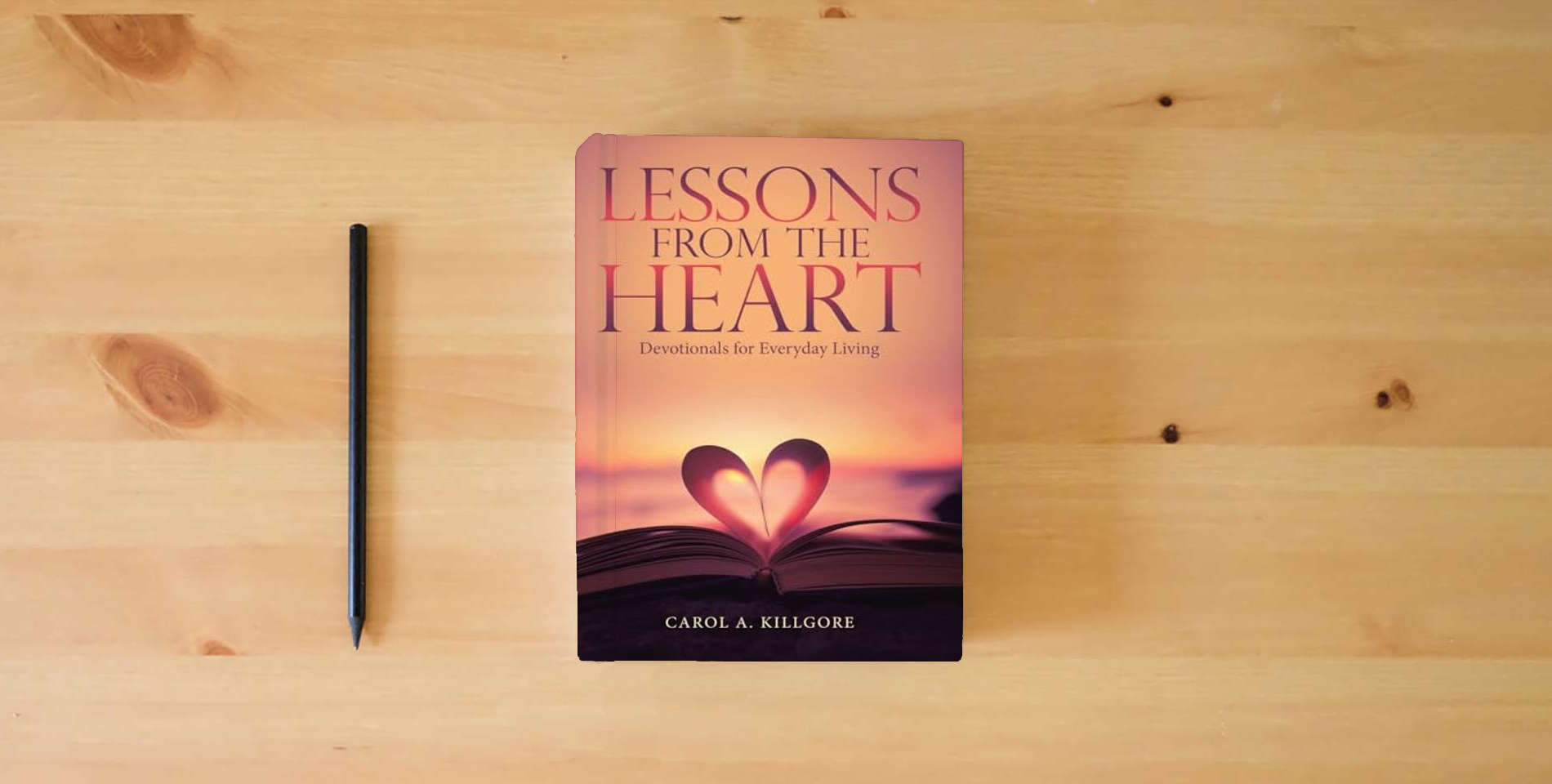 The book Lessons from the Heart: Devotionals for Everyday Living is on the table
