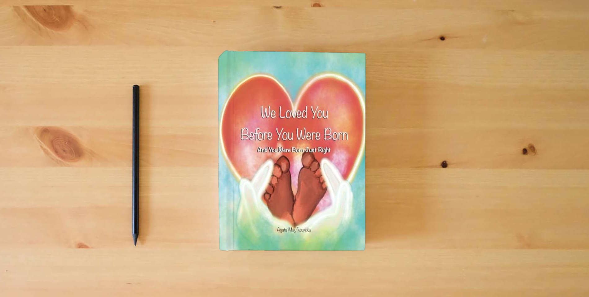The book We Loved You Before You Were Born: And You Were Born Just Right - Expanded Keepsake Edition is on the table