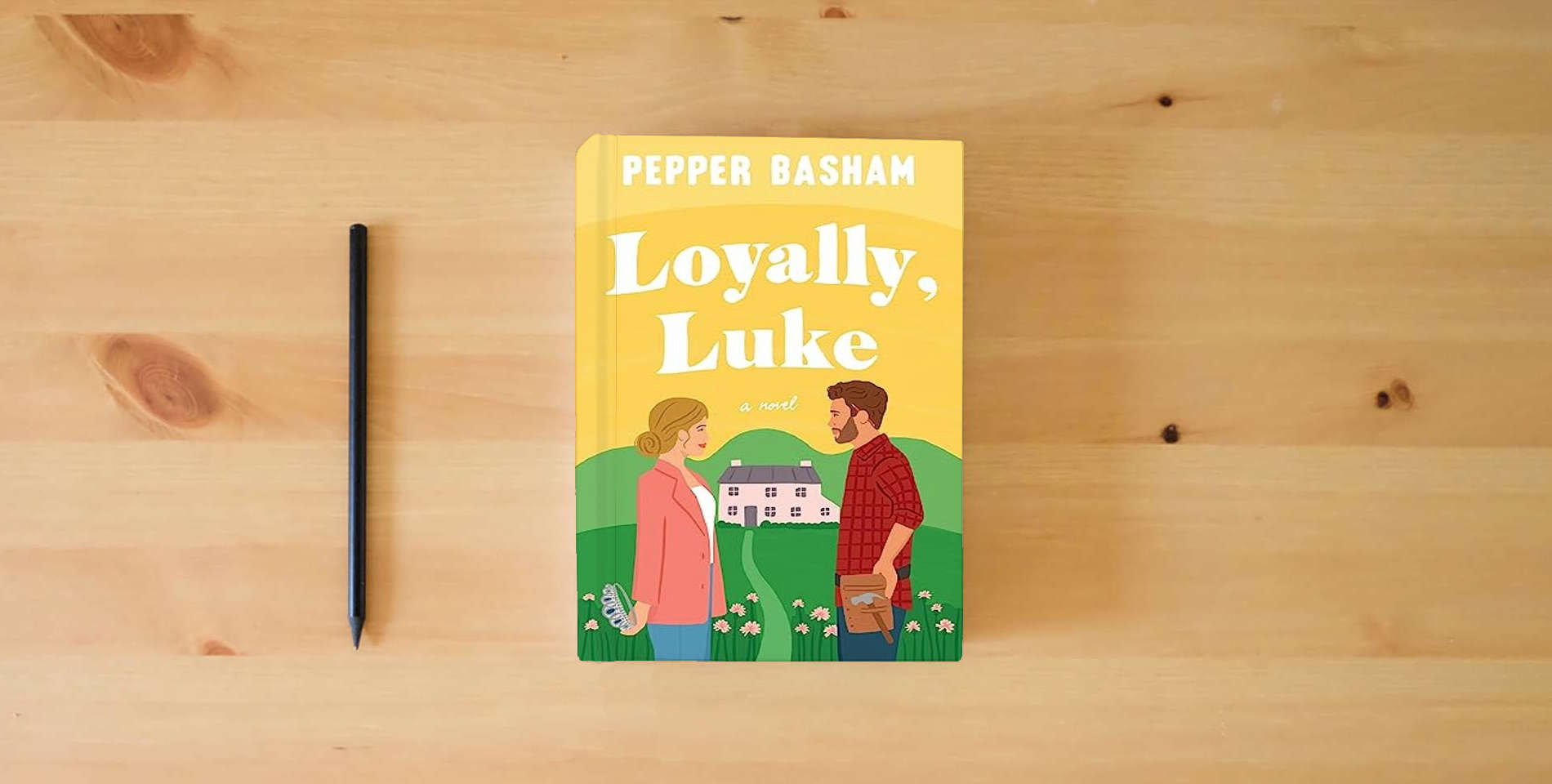 The book Loyally, Luke is on the table