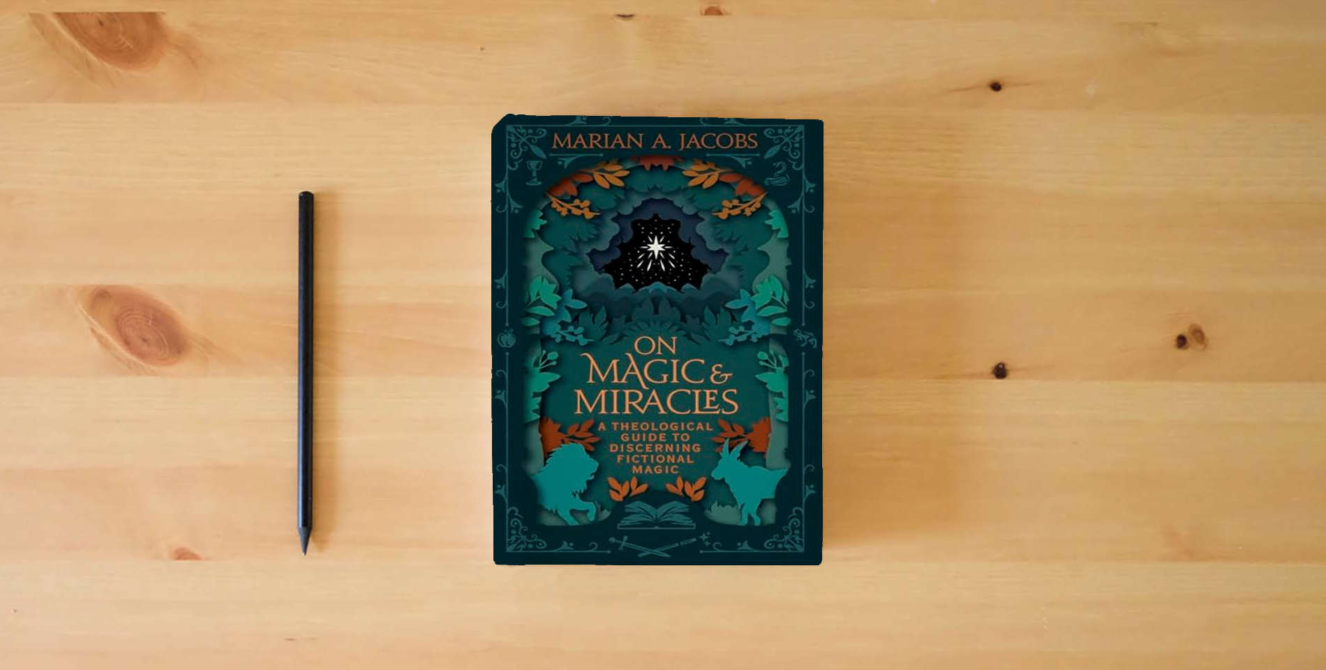 The book On Magic & Miracles: A Theological Guide to Discerning Fictional Magic is on the table