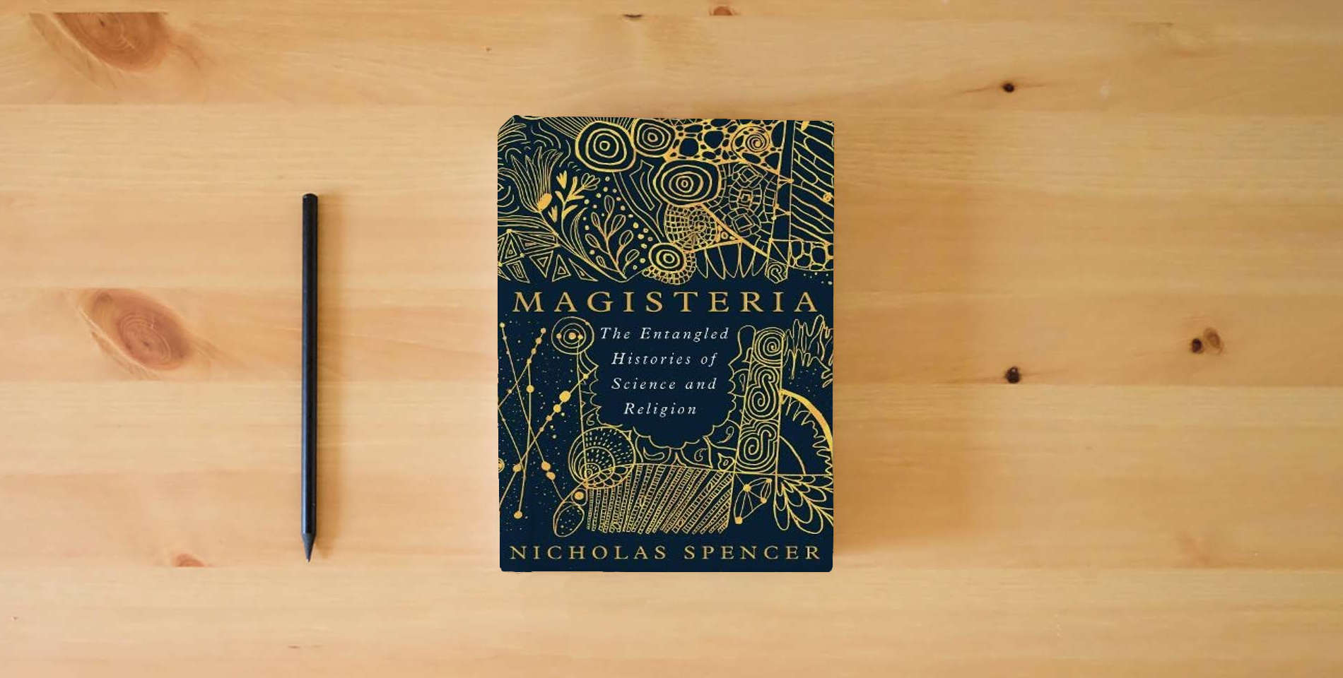 The book Magisteria: The Entangled Histories of Science & Religion is on the table
