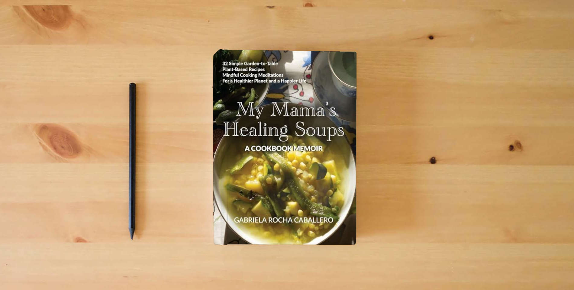 The book My Mama's Healing Soups is on the table