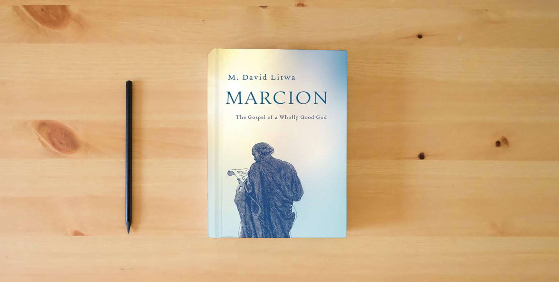 The book Marcion: The Gospel of a Wholly Good God is on the table