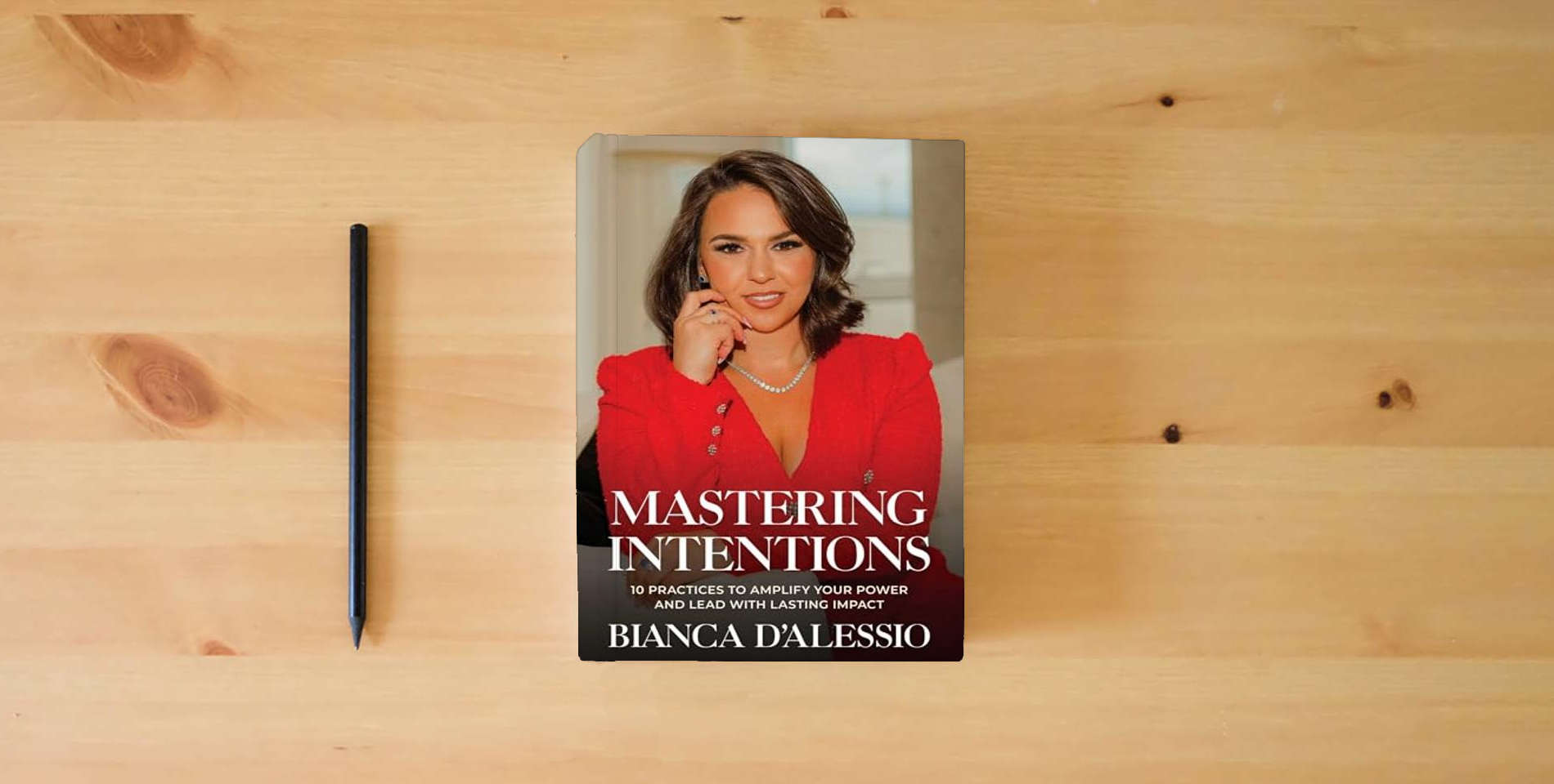 The book Mastering Intentions: 10 Practices to Amplify Your Power and Lead with Lasting Impact is on the table