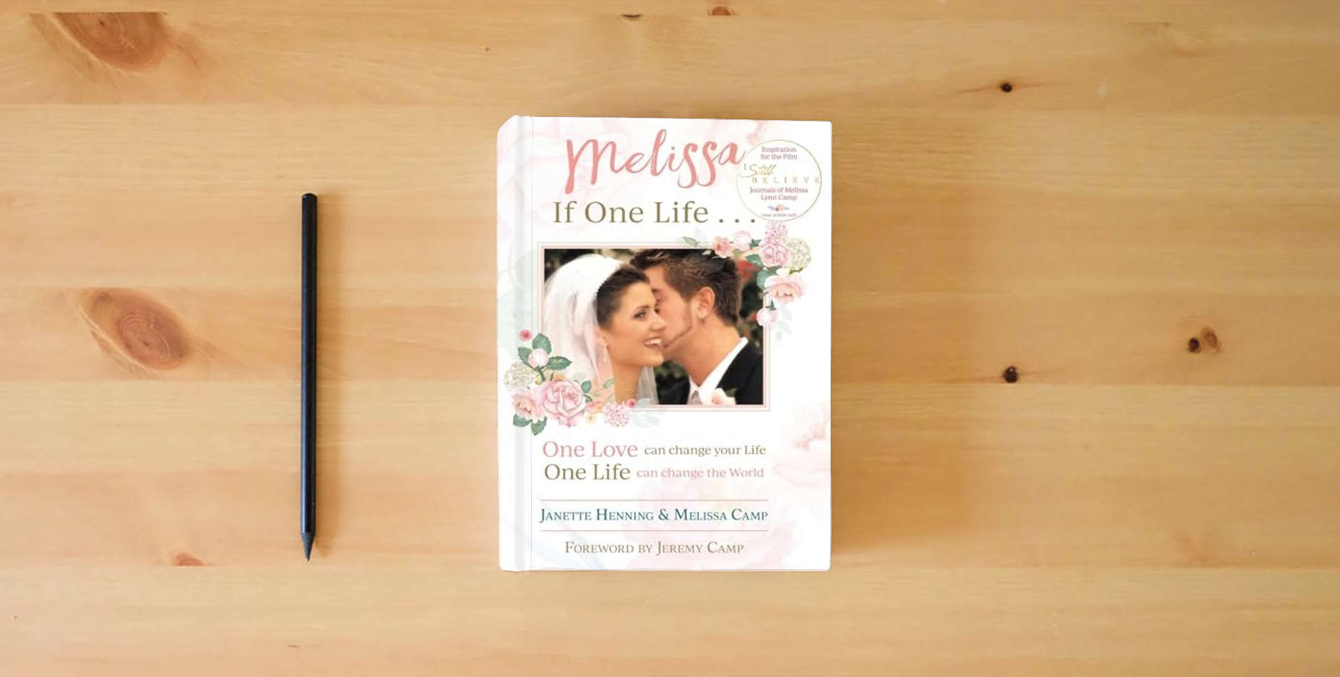 The book Melissa If One Life ... is on the table