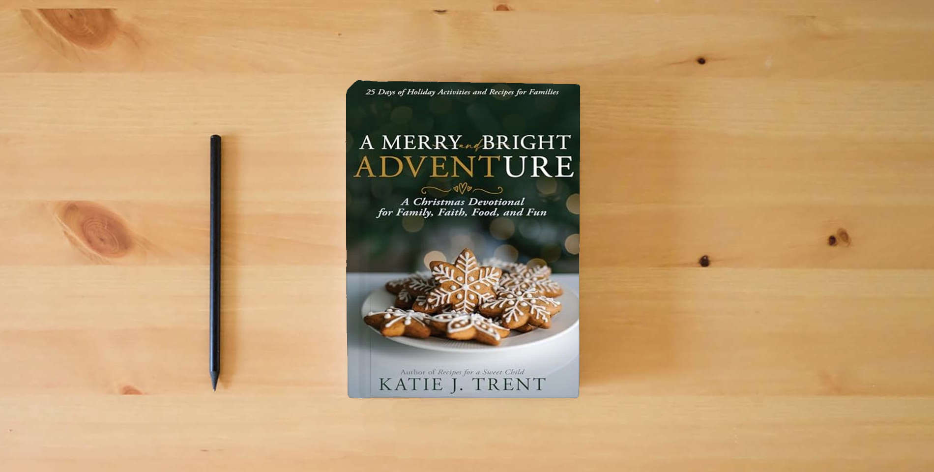 The book A Merry and Bright Adventure: A Christmas Devotional for Family, Faith, Food, and Fun is on the table