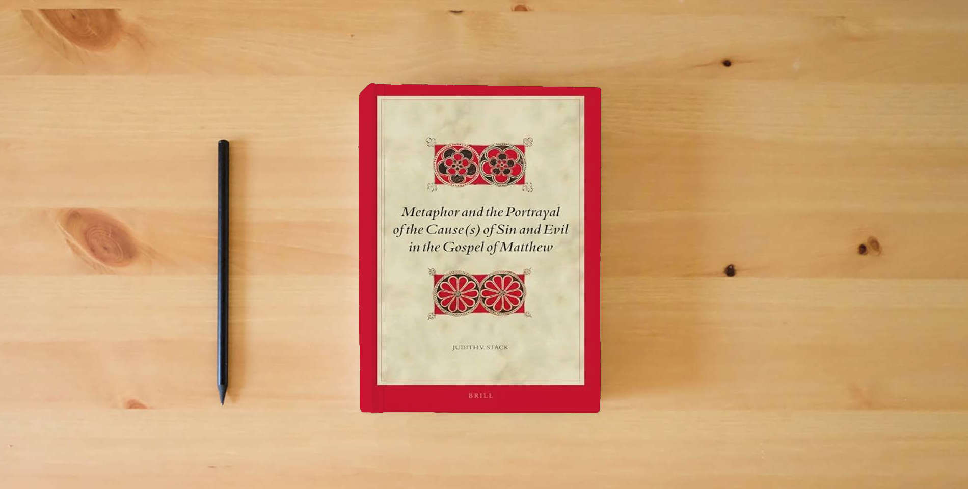 The book Metaphor and the Portrayal of the Cause(s) of Sin and Evil in the Gospel of Matthew (Biblical Interpretation Series, 182) is on the table