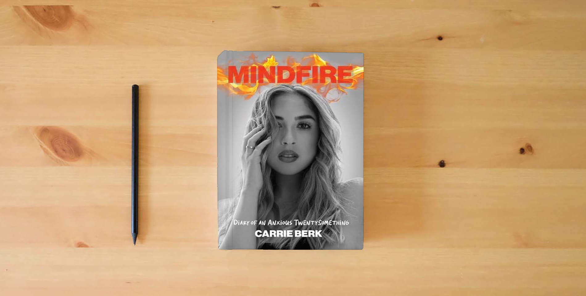 The book Mindfire: Diary of an Anxious Twentysomething is on the table