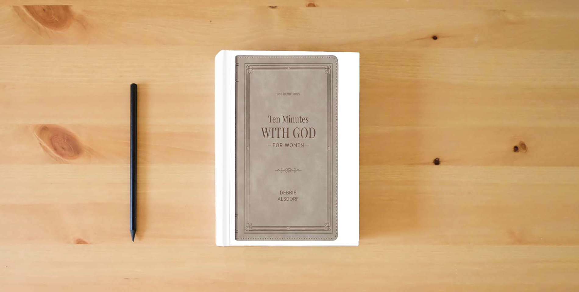 The book 10 Minutes with God for Women: 365 Daily Devotions is on the table