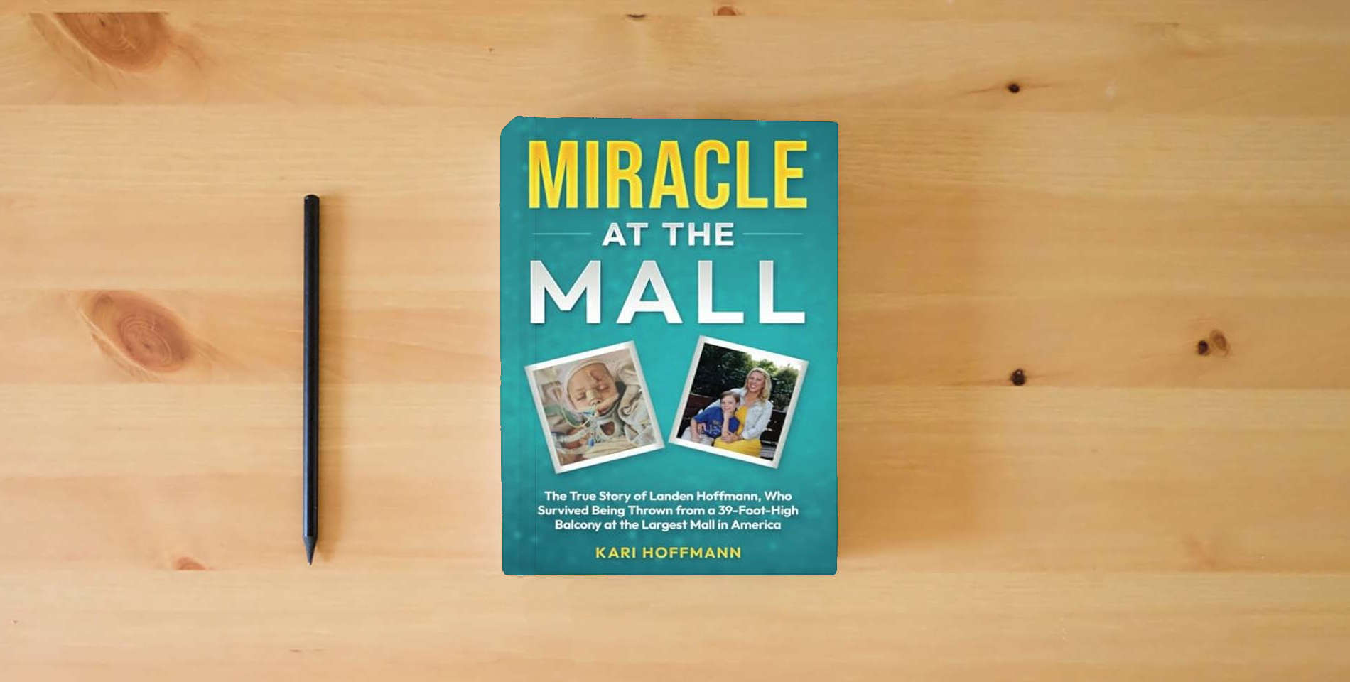 The book Miracle at the Mall: The True Story of Landen Hoffmann, Who Survived Being Thrown from a 39-Foot-High Balcony at the Largest Mall in America is on the table