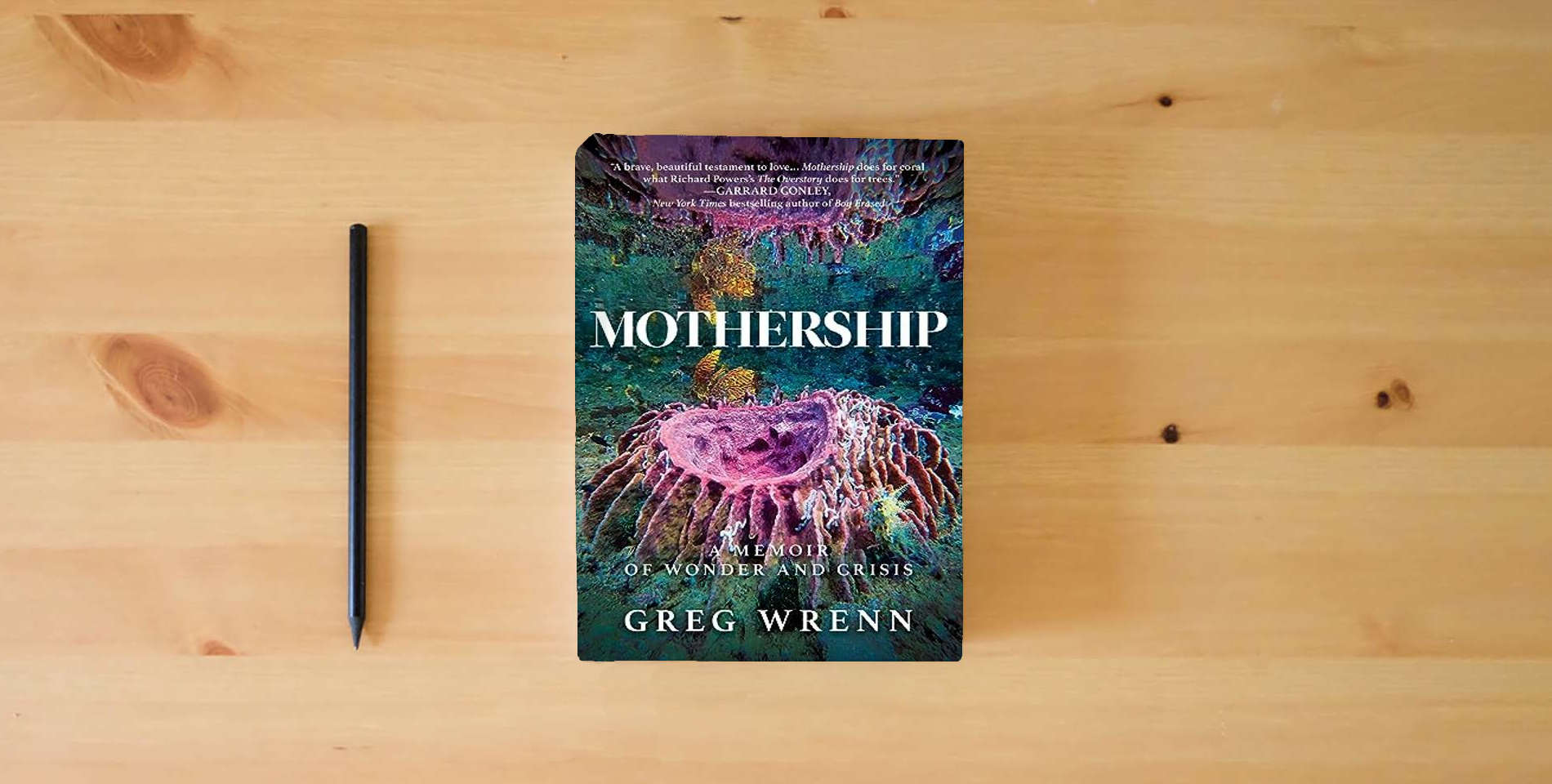 The book Mothership: A Memoir of Wonder and Crisis is on the table