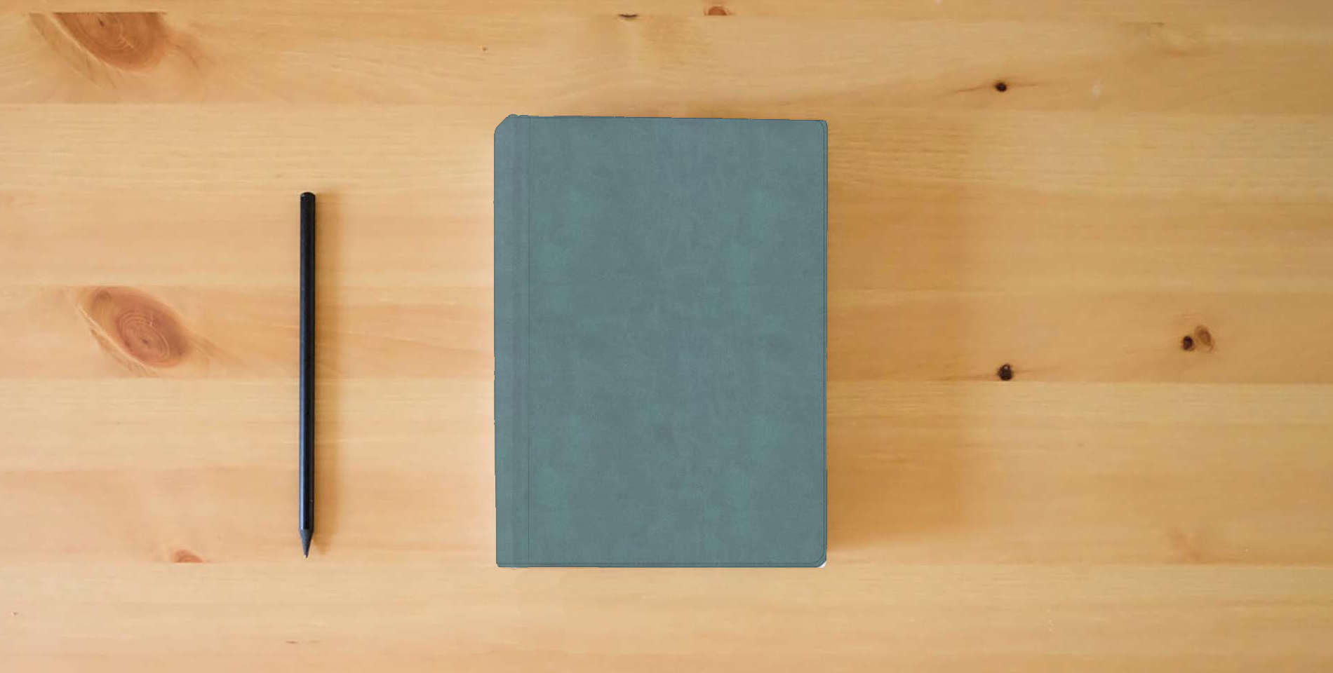 The book NASB Notetaking Bible, Large Print Edition, Earthen Teal SuedeSoft LeatherTouch, Single-Column, Black Letter, Wide Margins, Journaling Space, Reading Plan, Sewn Binding, Easy-to-Read Karmina Type is on the table