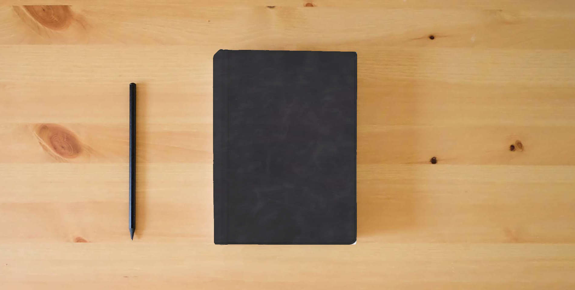 The book NASB Verse-by-Verse Reference Bible, Holman Handcrafted Collection, Marbled Slate Premium Calfskin, Black Letter, Two-Color Design, Bold Chapter/Verse Numbers, Cross-Reference System, Full-Color Maps is on the table