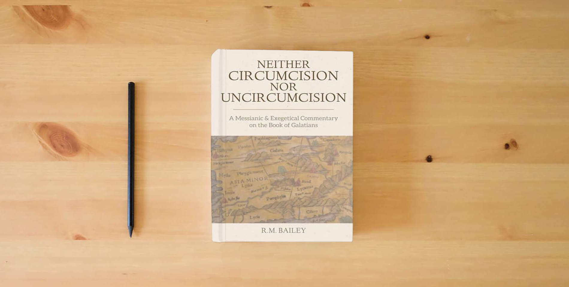 The book Neither Circumcision Nor Uncircumcision: A Messianic and Exegetical Commentary on the Book of Galatians is on the table