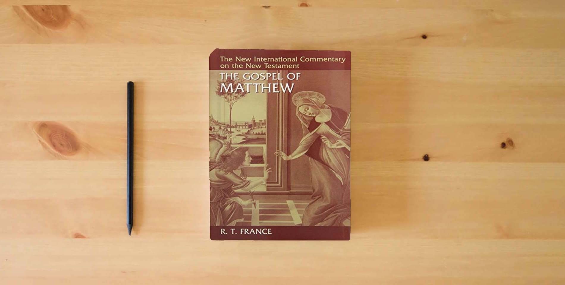 The book New International Commentary on the New Testament (Set of 18 volumes) is on the table
