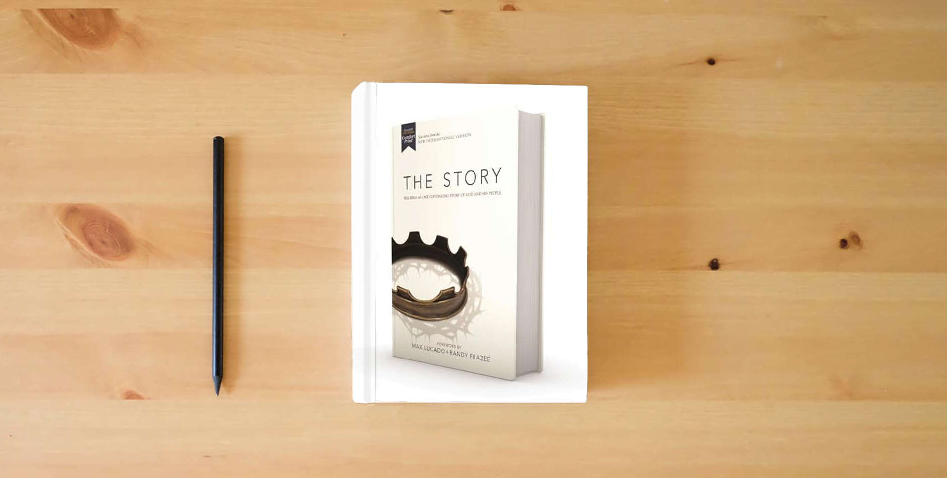 The book NIV, The Story, Hardcover, Comfort Print: The Bible as One Continuing Story of God and His People is on the table