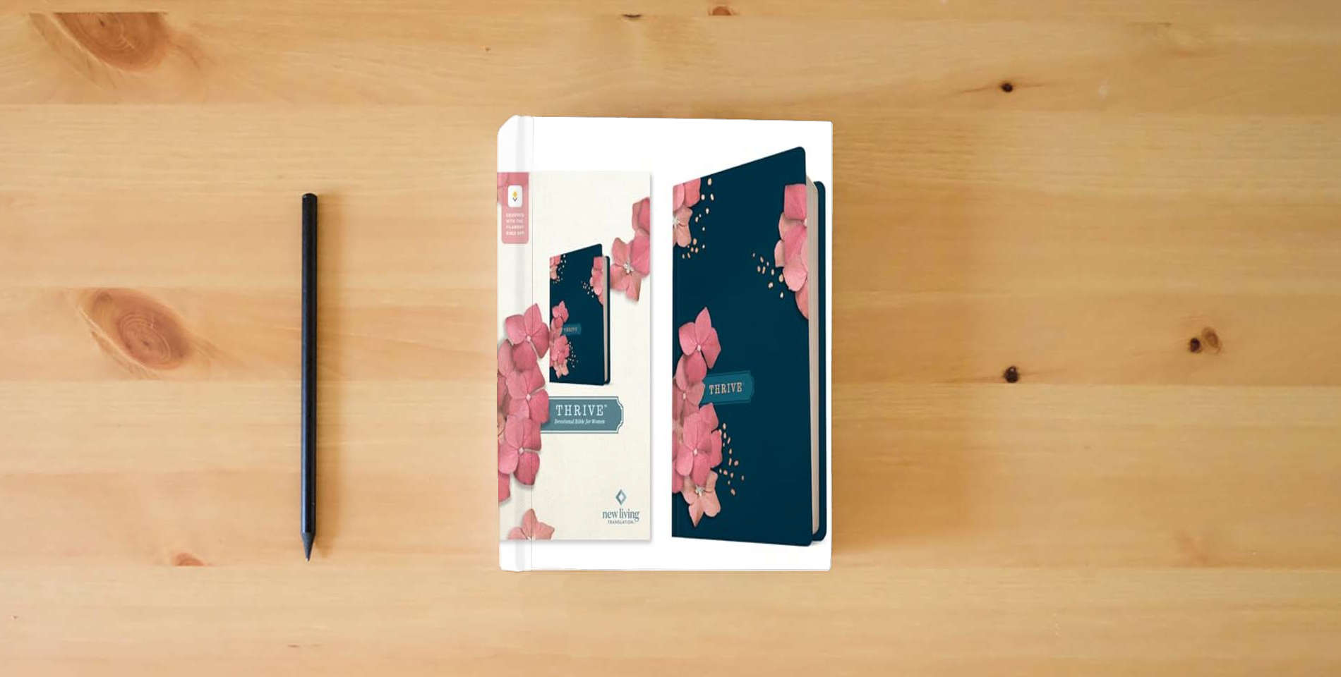 The book NLT THRIVE Devotional Bible for Women, Filament Enabled (Hardcover) is on the table