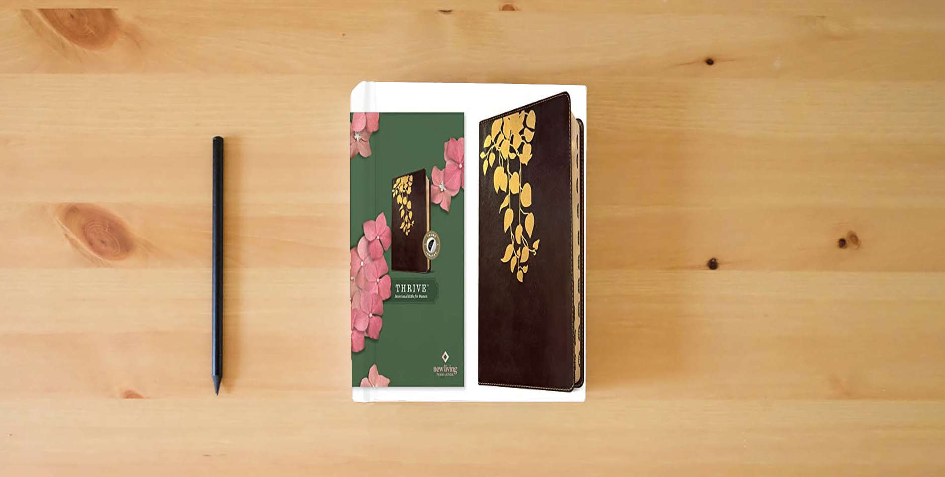 The book NLT THRIVE Devotional Bible for Women (LeatherLike, Cascade Deep Brown, Indexed) is on the table