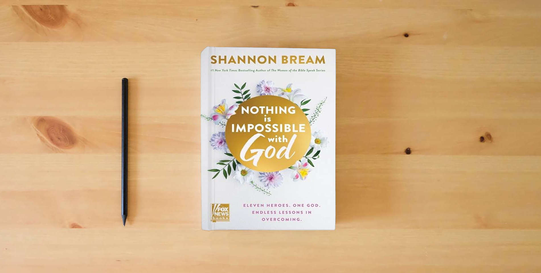 The book Nothing Is Impossible with God: Eleven Heroes. One God. Endless Lessons in Overcoming. is on the table
