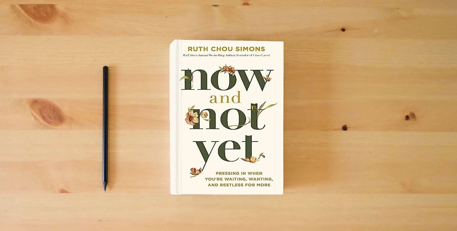 The book Now and Not Yet: Pressing in When You’re Waiting, Wanting, and Restless for More is on the table