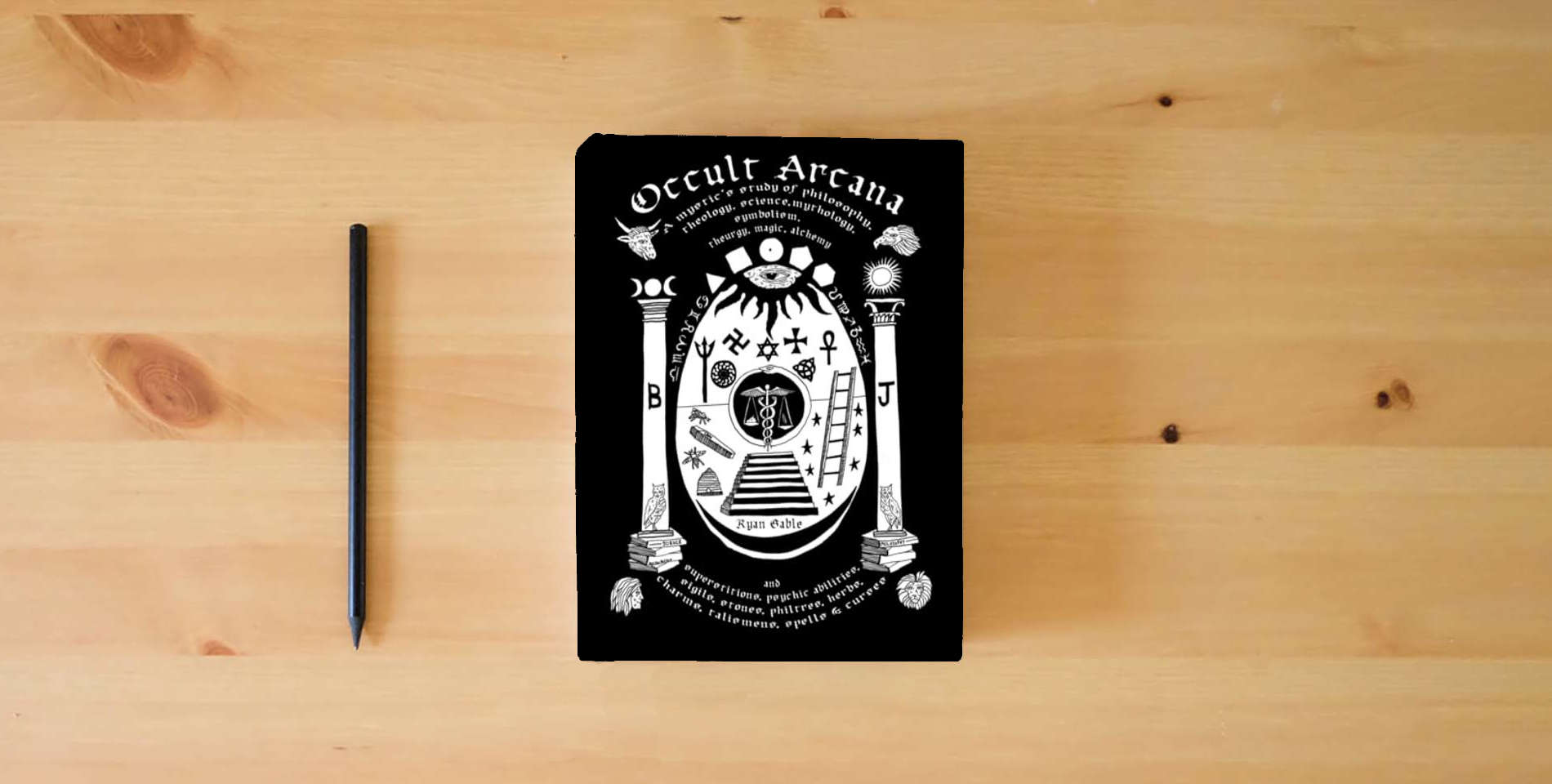 The book Occult Arcana is on the table