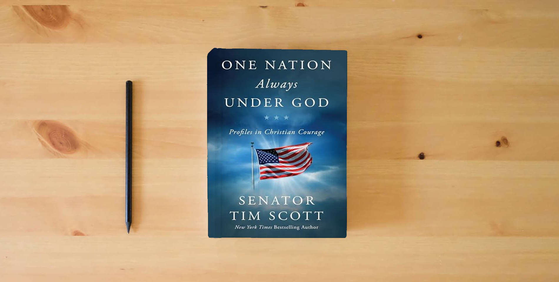 The book One Nation Always Under God: Profiles in Christian Courage is on the table