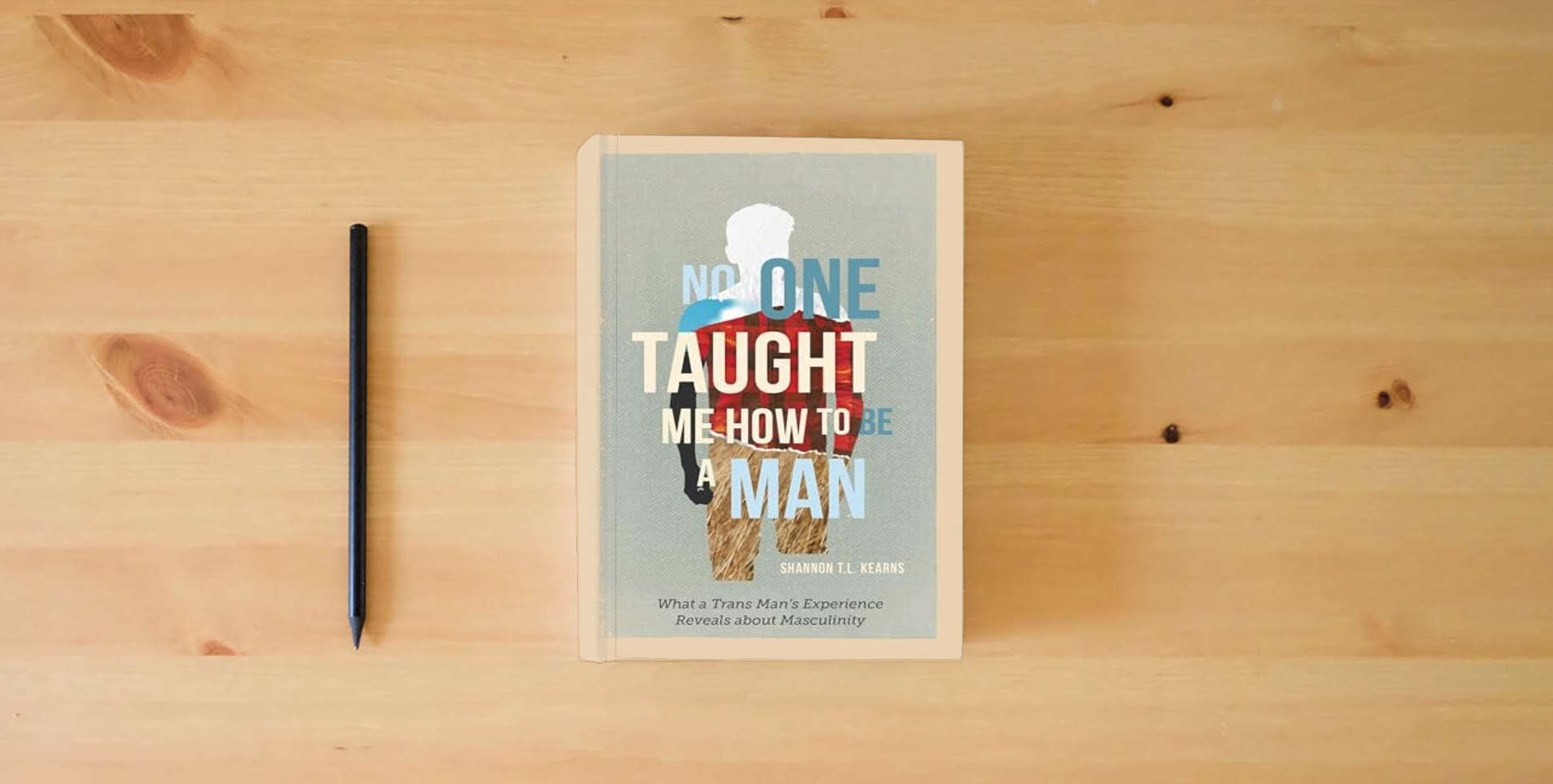 The book No One Taught Me How to Be a Man: What a Trans Man's Experience Reveals about Masculinity is on the table